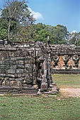 Angkor Thom - Terrace of the Elephants, elephant heads with trunks forming pillars.